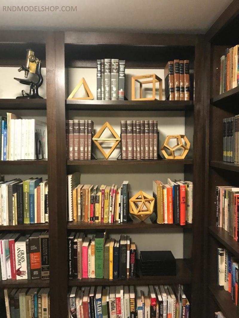 6" size Platonic Solids in a bookshelf